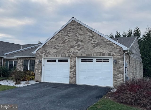 exterior space with a garage