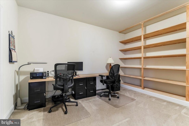 office space with light colored carpet