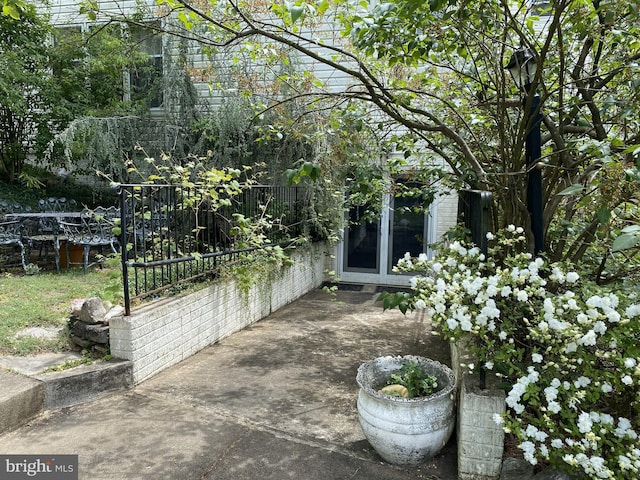 view of patio featuring french doors