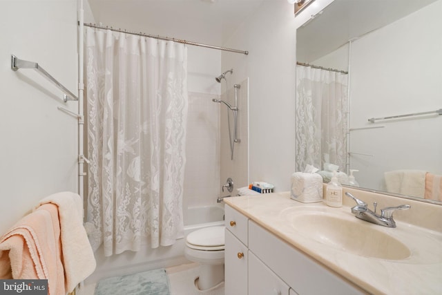 full bathroom featuring shower / bath combination with curtain, vanity, and toilet