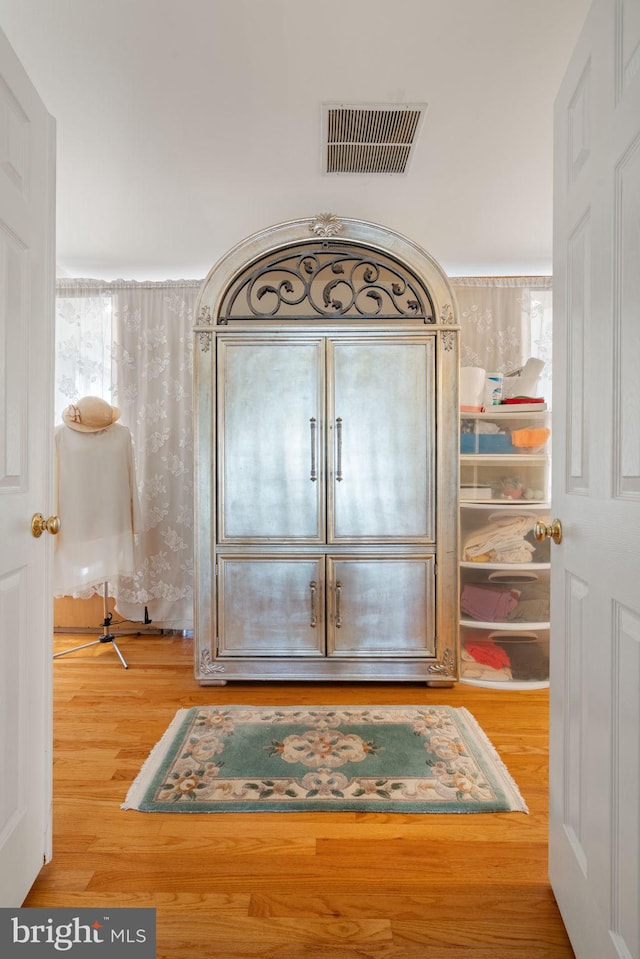 foyer entrance featuring hardwood / wood-style floors