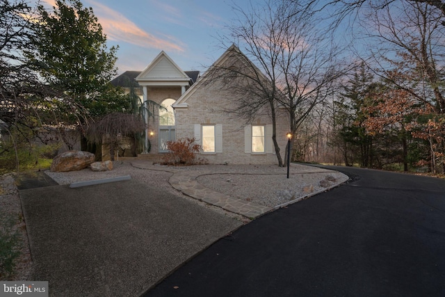 view of property exterior at dusk