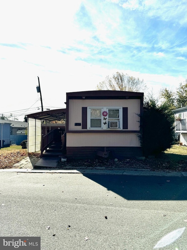 view of front of house featuring a carport