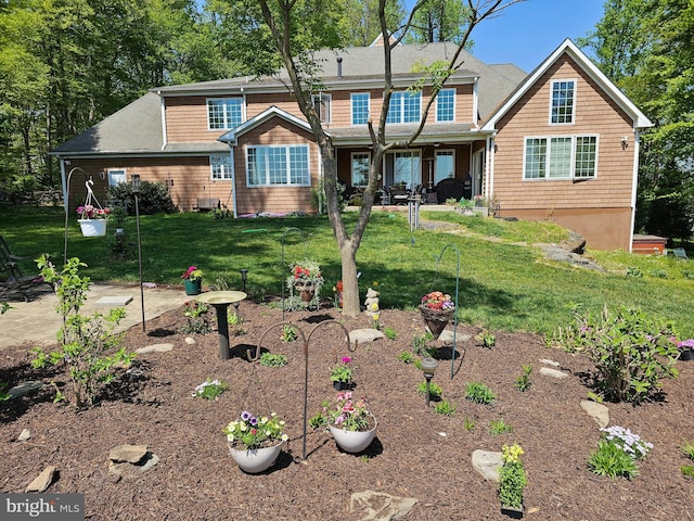 586 Corrine Rd, West Chester, PA 19382 - view of front facade featuring a front yard