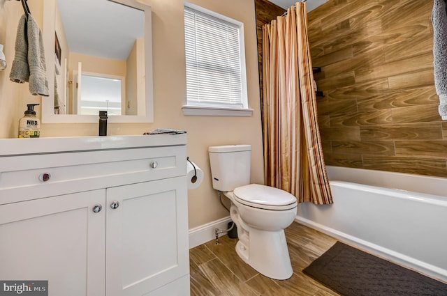 full bathroom featuring hardwood / wood-style flooring, vanity, toilet, and shower / bathtub combination with curtain