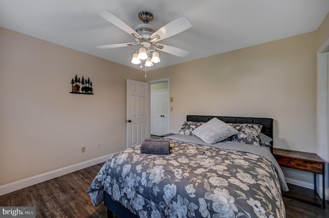 bedroom with ceiling fan and dark wood-type flooring