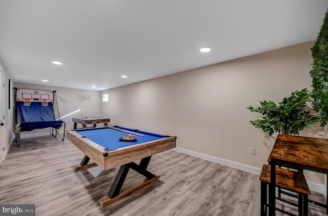 recreation room featuring pool table and light hardwood / wood-style flooring