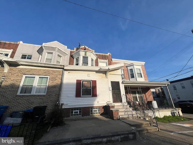 multi unit property featuring covered porch