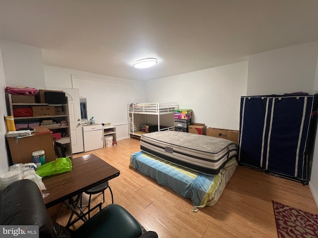 bedroom featuring light wood-type flooring