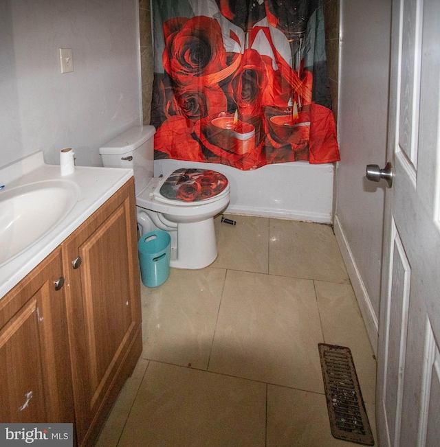 full bathroom with tile patterned flooring, vanity, toilet, and shower / tub combo with curtain