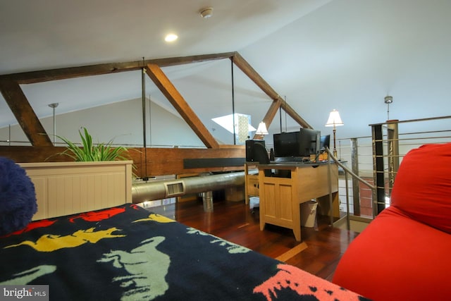 bedroom featuring dark hardwood / wood-style flooring and lofted ceiling