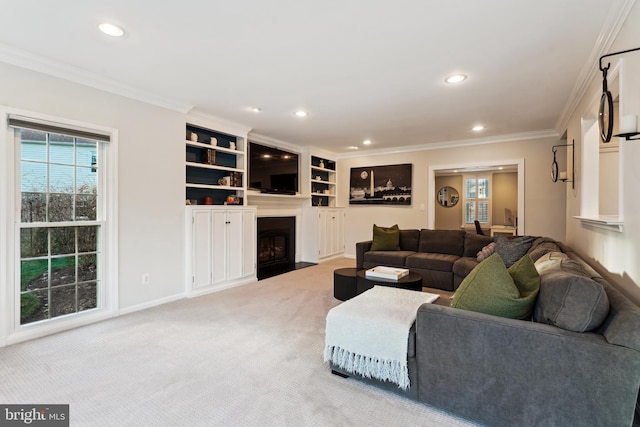 carpeted living room with crown molding