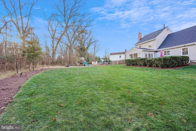 view of yard with a playground