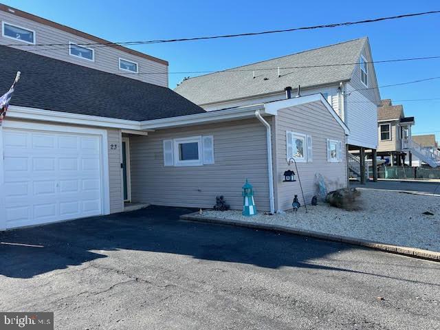 exterior space with a garage