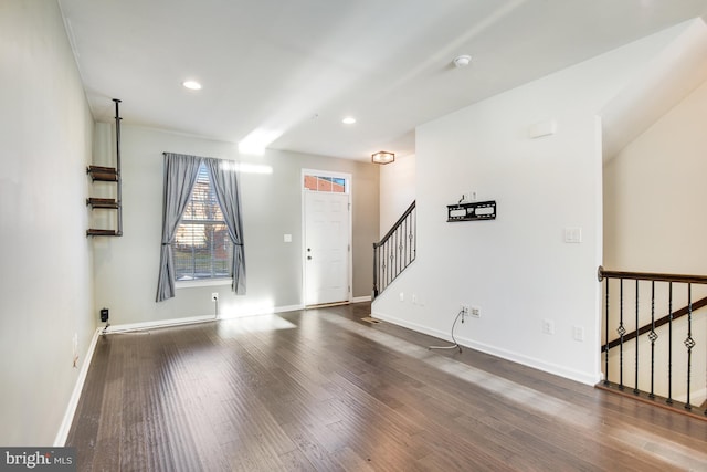 interior space with dark hardwood / wood-style flooring