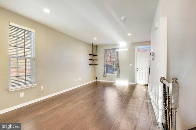 empty room with wood-type flooring