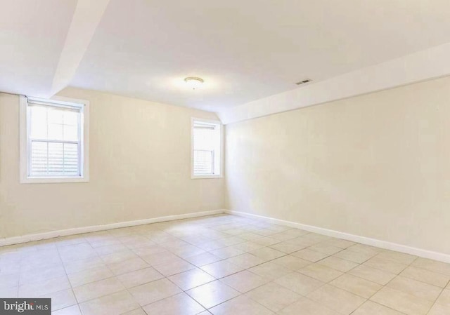 6614 Quander Rd, Alexandria, VA 22307 - empty room featuring light tile patterned floors and a wealth of natural light