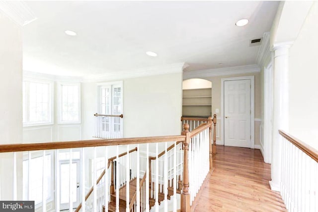 6614 Quander Rd, Alexandria, VA 22307 - corridor featuring ornate columns, ornamental molding, and light wood-type flooring