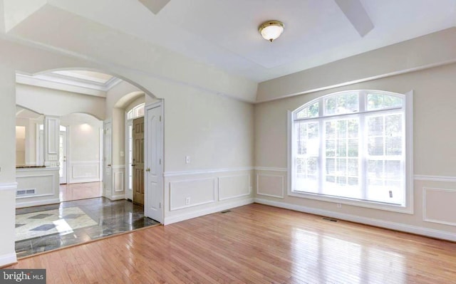 6614 Quander Rd, Alexandria, VA 22307 - unfurnished room featuring hardwood / wood-style floors and decorative columns