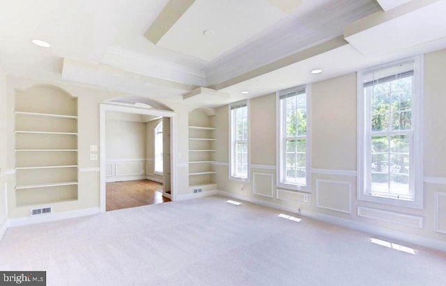 6614 Quander Rd, Alexandria, VA 22307 - spare room featuring crown molding, built in features, and light colored carpet