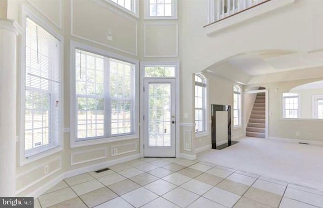 6614 Quander Rd, Alexandria, VA 22307 - entrance foyer with plenty of natural light, light tile patterned floors, and a high ceiling