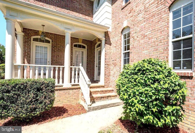 6614 Quander Rd, Alexandria, VA 22307 - entrance to property with a porch