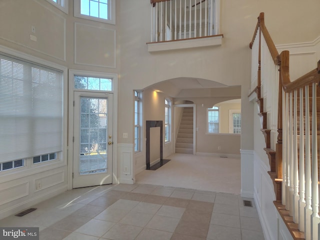 6614 Quander Rd, Alexandria, VA 22307 - tiled foyer entrance featuring a towering ceiling