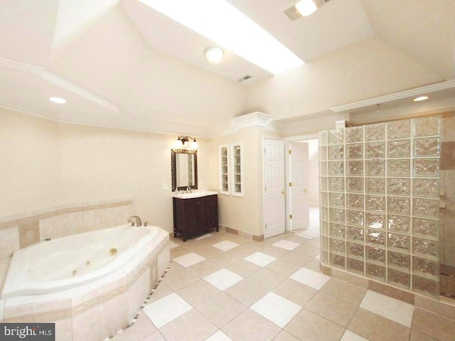6614 Quander Rd, Alexandria, VA 22307 - bathroom featuring tile patterned flooring, vanity, and a relaxing tiled tub