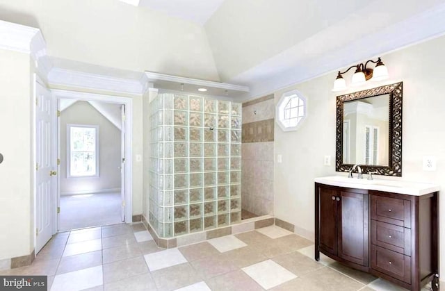 6614 Quander Rd, Alexandria, VA 22307 - bathroom featuring tile patterned flooring, vanity, walk in shower, and vaulted ceiling