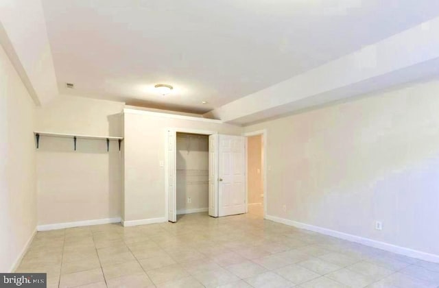 6614 Quander Rd, Alexandria, VA 22307 - unfurnished bedroom featuring light tile patterned floors and a closet