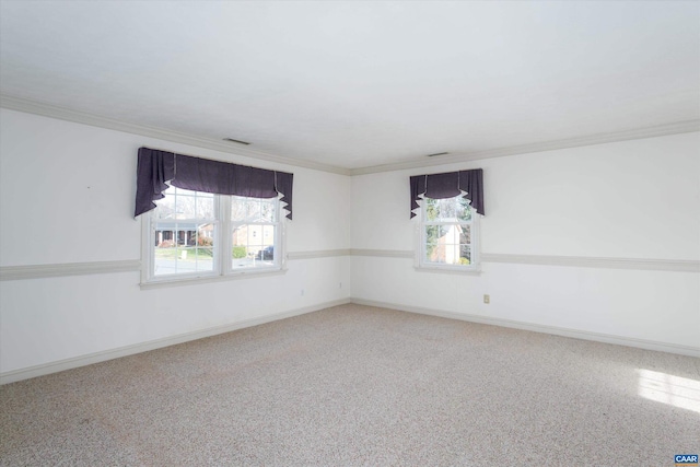 carpeted empty room with ornamental molding