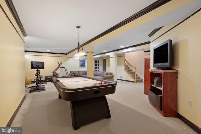 game room featuring crown molding and light colored carpet