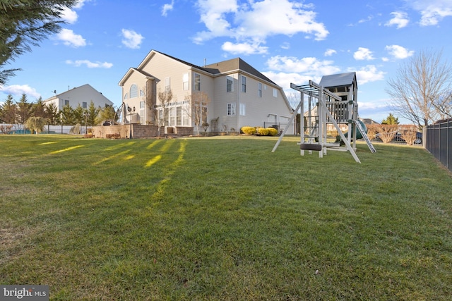 view of yard with a playground