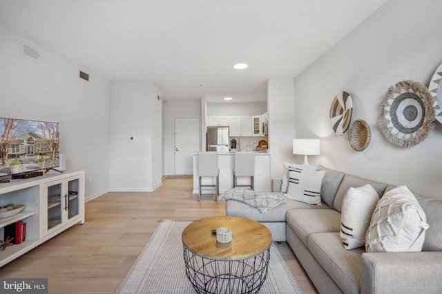 living room with light wood-type flooring