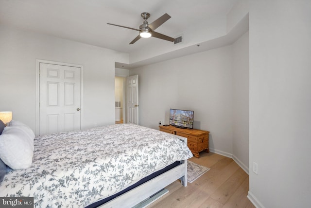 1645 International Dr Unit 121, Mclean, VA 22102 - bedroom with light wood-style floors and a ceiling fan