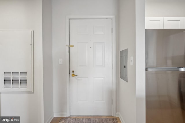 1645 International Dr Unit 121, Mclean, VA 22102 - entryway featuring baseboards and electric panel