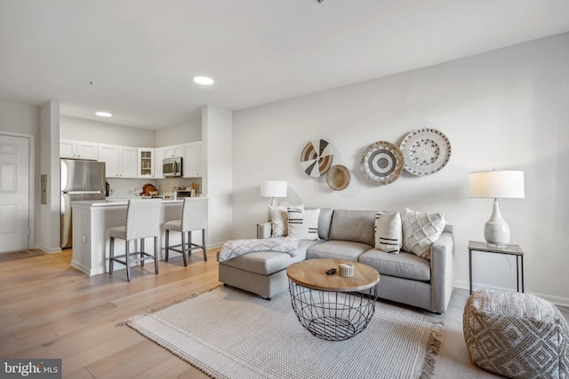 living room featuring light wood-type flooring