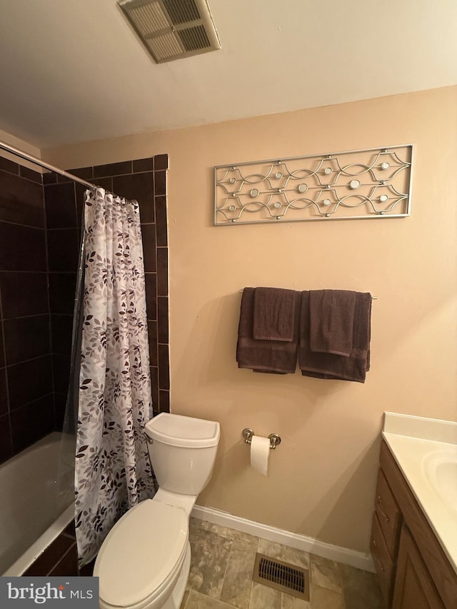 full bathroom featuring vanity, toilet, and shower / bath combo