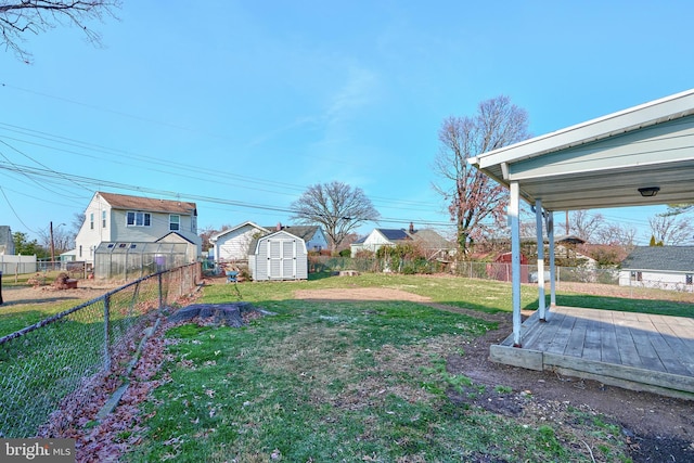 view of yard with a storage shed