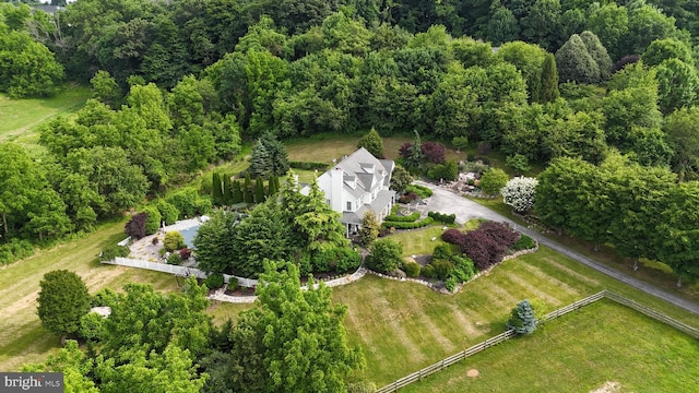 aerial view with a wooded view