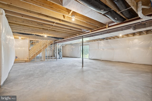 basement featuring water heater