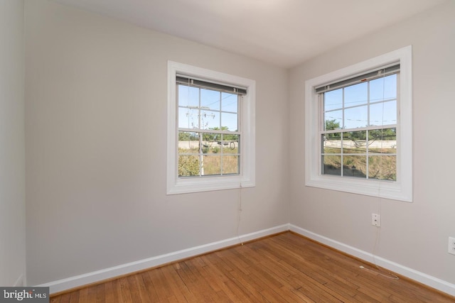 empty room featuring hardwood / wood-style flooring