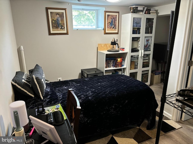 bedroom featuring light hardwood / wood-style flooring