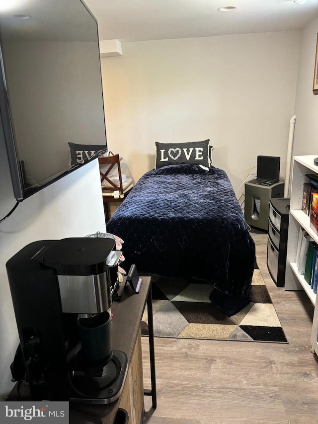 bedroom with light wood-type flooring