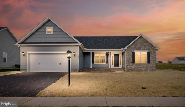 view of front of home with a garage