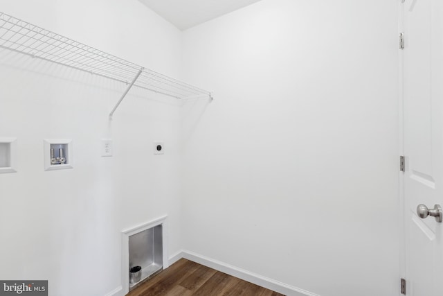 laundry area featuring hookup for a washing machine, dark wood-type flooring, and hookup for an electric dryer