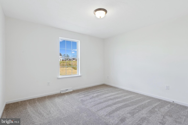 view of carpeted spare room