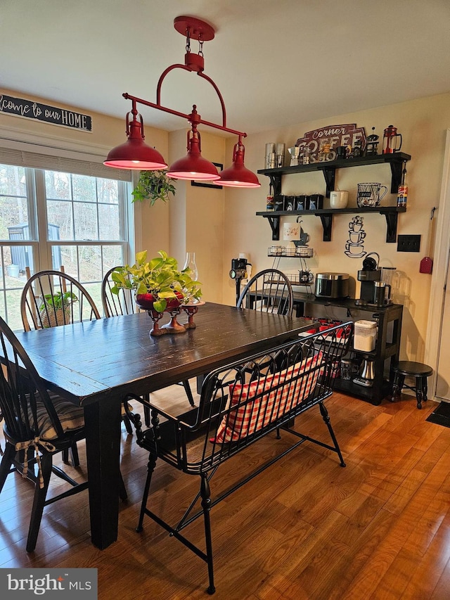 dining area featuring hardwood / wood-style flooring