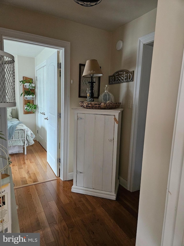 hall featuring dark hardwood / wood-style floors