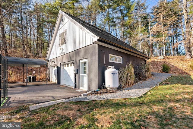 garage featuring a carport